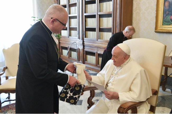 "POPE FRANCIS GIVEN GLOVES BY FINNISH BISHOPS IN A WARM MEETING"